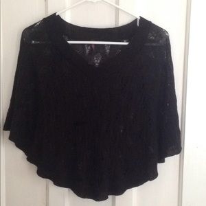 Knit poncho style sweater